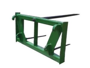 Image of a green John Deere Bale Spear with two metal prongs, used for handling and transporting bales.