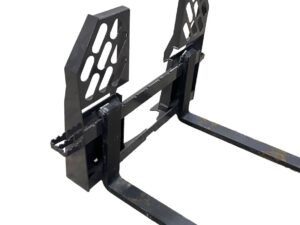 A Skid-Steer Walk-In Pallet Fork, a black metal attachment featuring two vertical plates and a rectangular frame, designed for connecting to machinery or vehicles like a skid-steer.