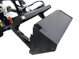 A close-up image of a black Mini Bobcat High Dump Bucket attachment for a Mini Bobcat, featured on a pavement surface with patches of snow.