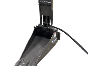 A Dingo Stump Bucket, an industrial grapple attachment designed for heavy machinery, is showcased in a workshop along with other versatile buckets and equipment, with various tools and machines visible in the background.