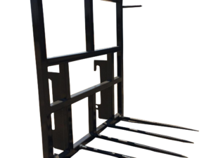 The JCB Wheel Loader Bale Spear is a durable attachment designed for tractors and wheel loaders such as JCB. Equipped with multiple spears, it is ideal for managing hay bales in a rustic rural setting, ensuring efficient hay handling.